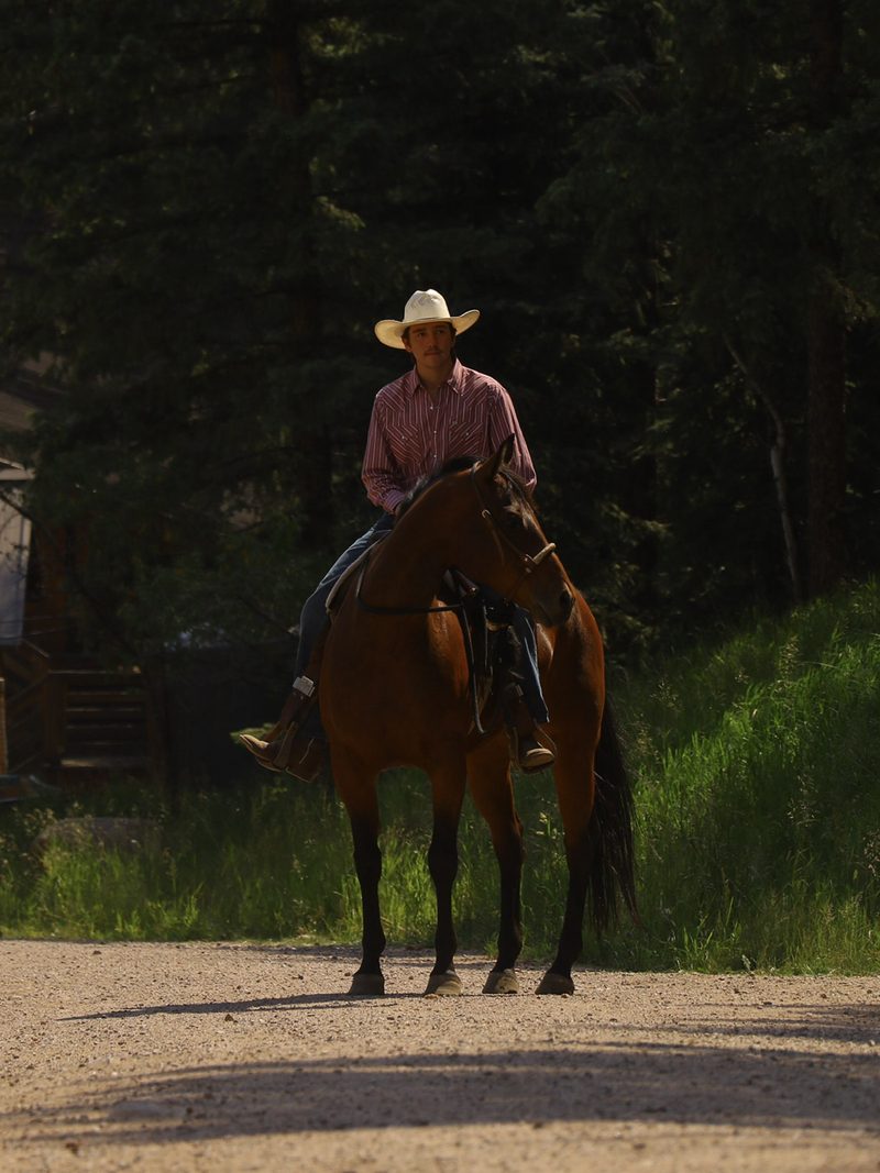 Hudson Elkjer on horseback with Warner